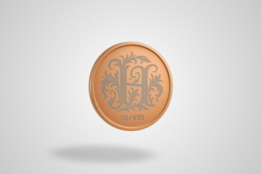 A photo of a laser engraved copper coin
